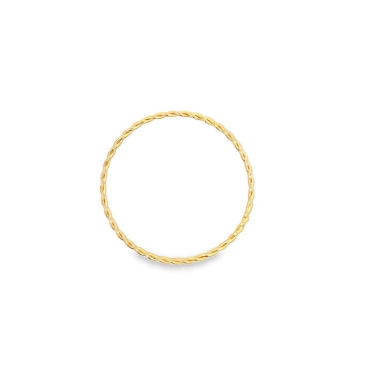 A thin, elegant twisted gold band ring rests on a plain white background.
