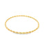 A slim gold twisted wire bangle rests against a plain white background.