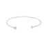 A sleek silver cuff bracelet features a sparkling diamond set at each open end against a clean white background.