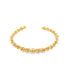 A polished gold cuff bracelet displays an intricate twisted rope design against a clean white background.