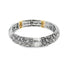 A two-tone silver and gold stretch bracelet displays intricate scrolling paisley patterns against a clean white background.