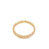 A textured tri-color gold ring glistens against a clean white background.