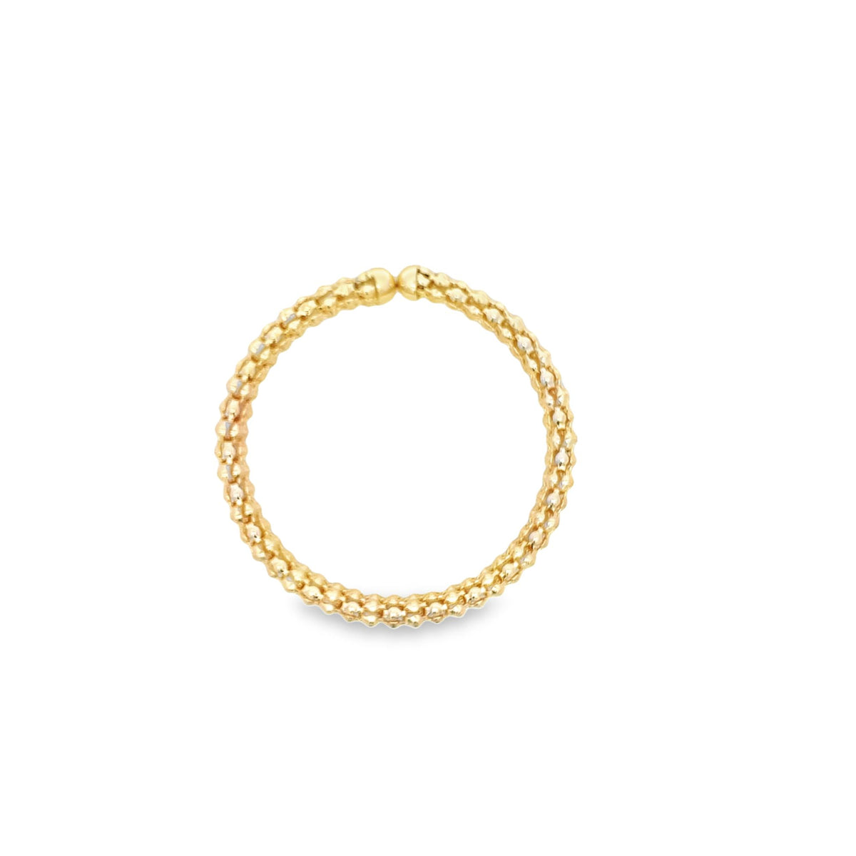 A delicate gold beaded hoop ring rests against a clean white background.