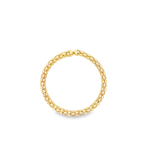 A delicate gold beaded hoop ring rests against a clean white background.