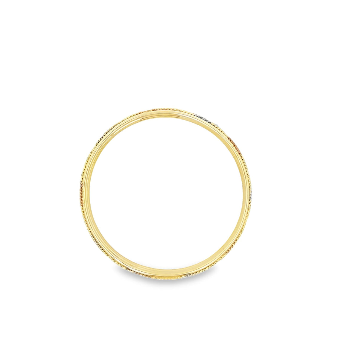 A slim tri-color gold wedding band rests flat against a clean white background, showcasing its interwoven yellow, white, and rose gold strands.
