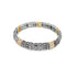 An intricate two-tone silver and gold stretch bracelet features ornate filigree metalwork accented with sparkling cubic zirconia crystals.