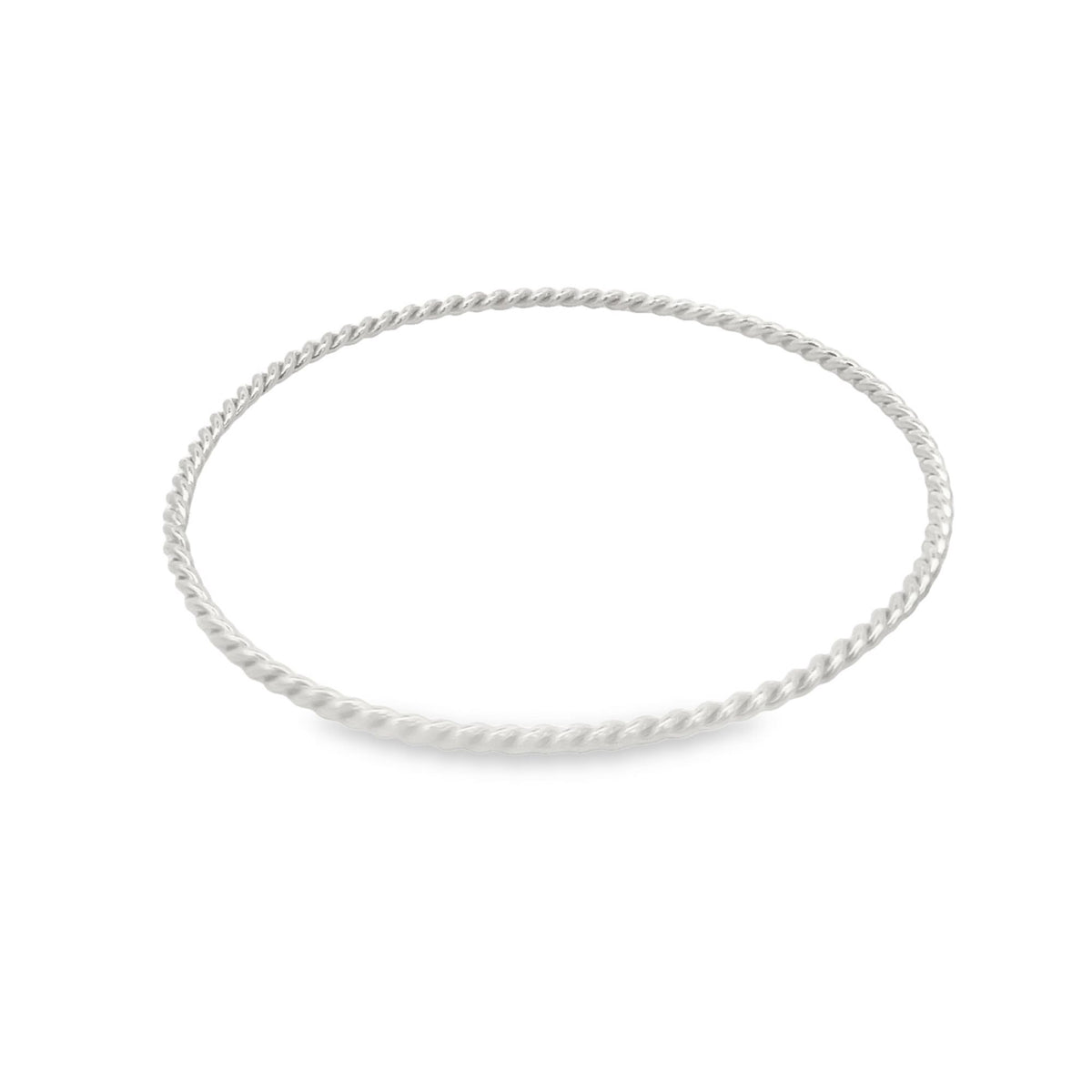 A thin, twisted silver bangle bracelet rests flat against a clean white background.