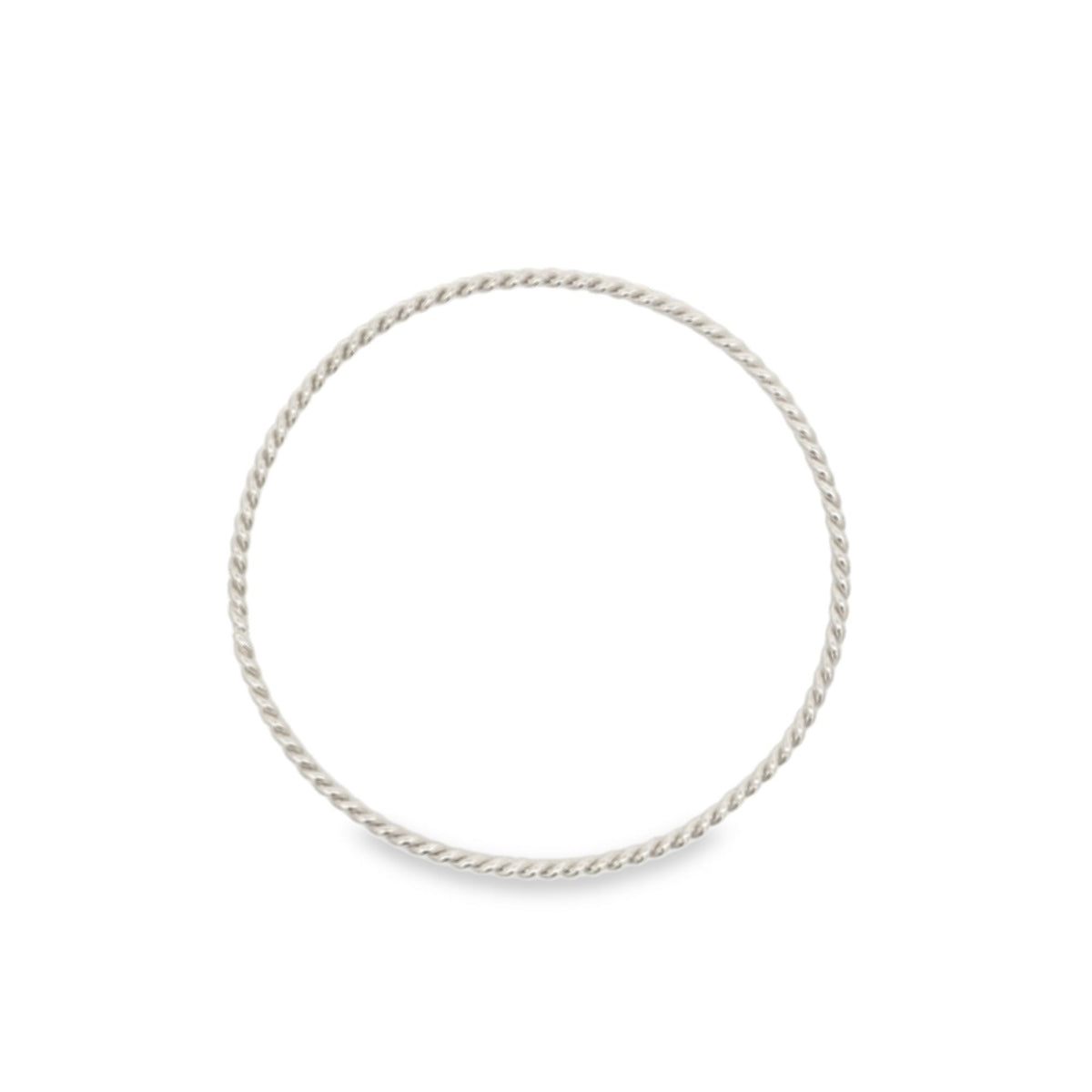 A delicate sterling silver twisted rope ring rests on a clean white background.