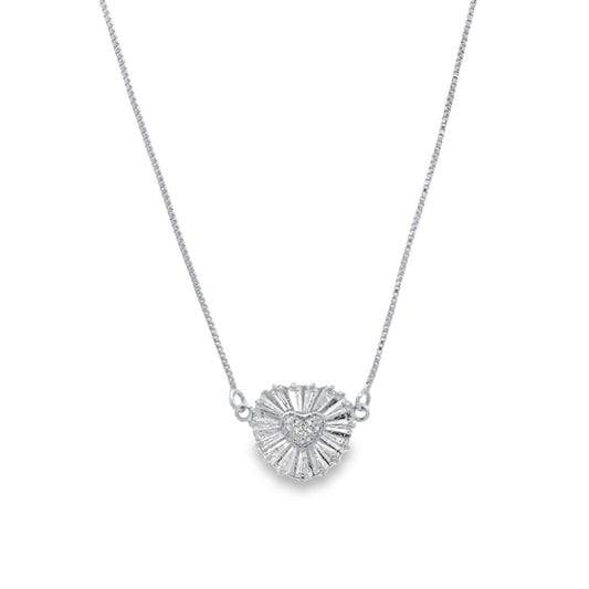 A delicate silver chain necklace features a sparkling diamond-accented heart pendant with a radiant sunburst design.