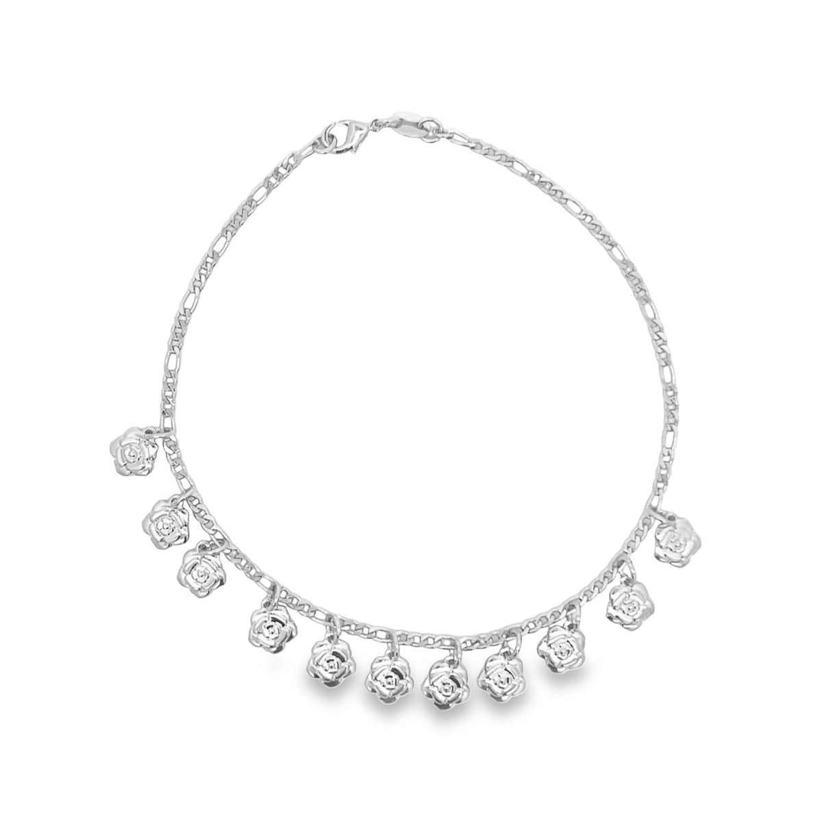 A delicate silver charm anklet features hanging rose charms arranged along a Figaro chain.