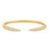 A gold pavé diamond cuff bracelet rests against a clean white background.