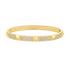 A gold hinged bangle bracelet features alternating sections of pavé-set crystals and smooth pyramidal studs against a clean white background.