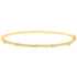A gold diamond station bangle bracelet rests horizontally against a plain white background.