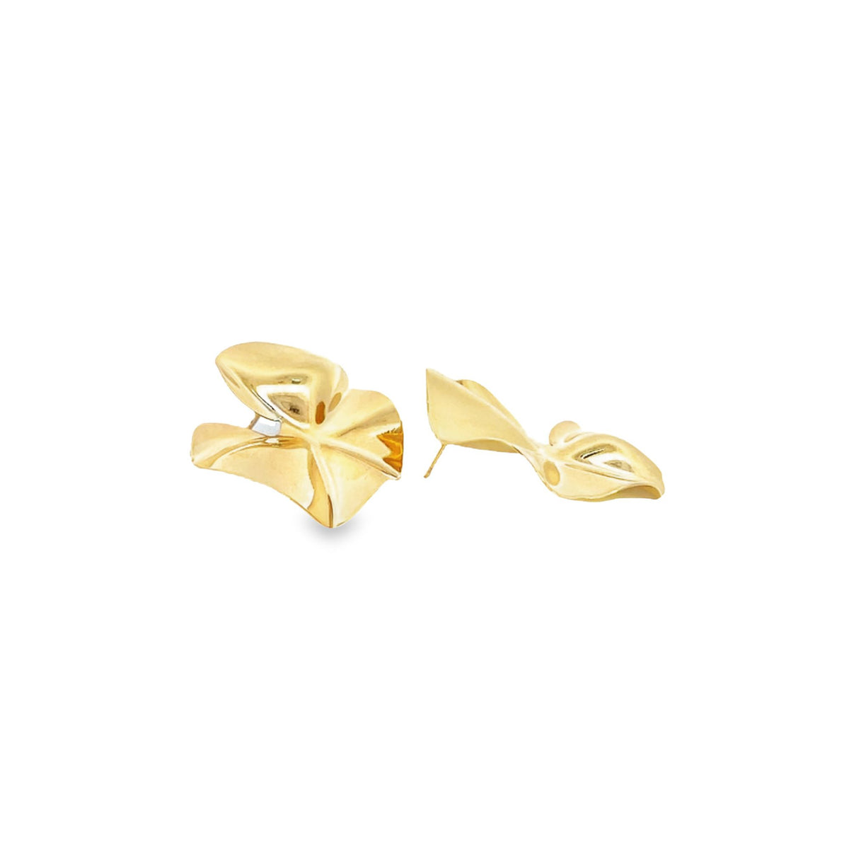 A pair of abstract gold earrings features polished, folded metal shapes against a plain white background.