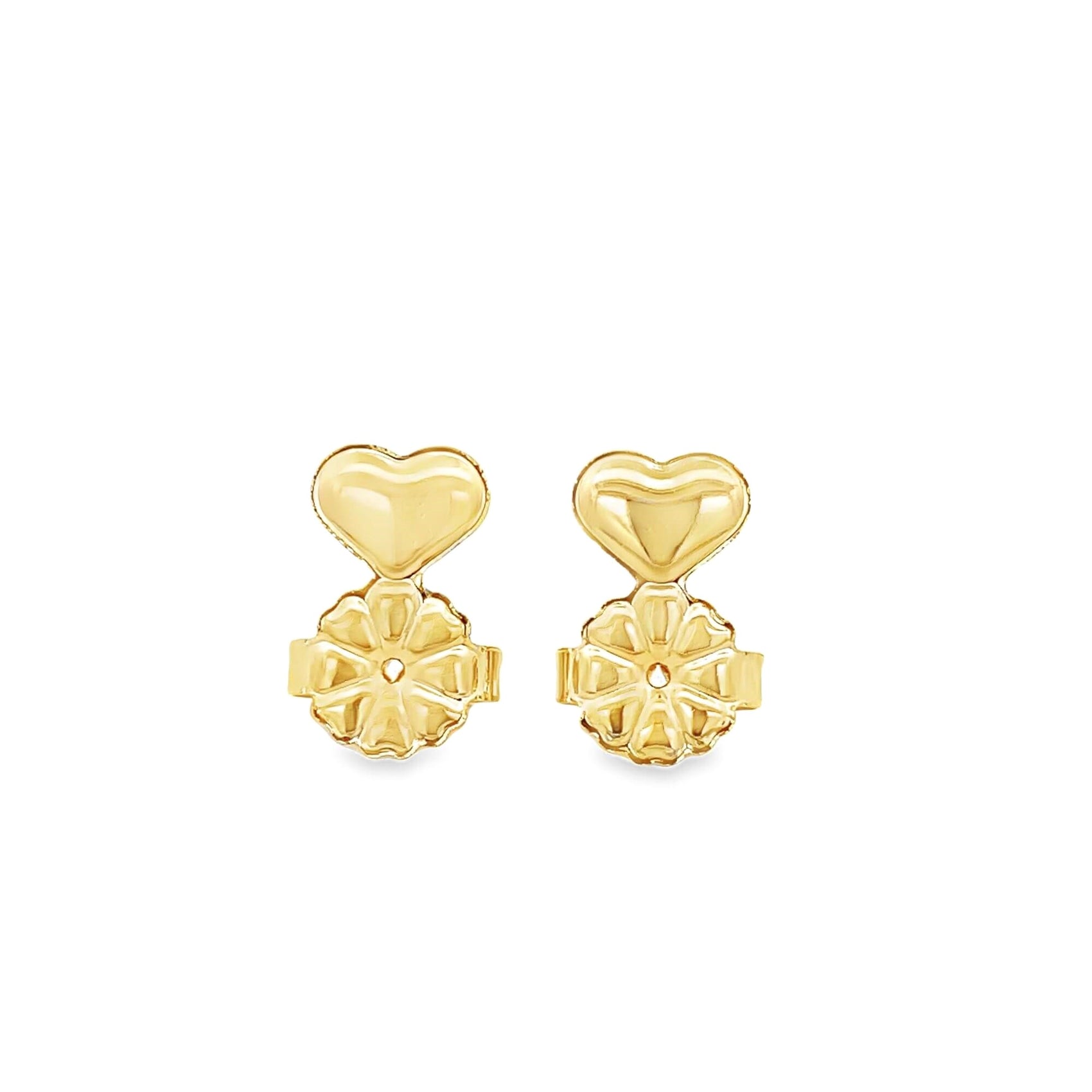 Two shiny gold earring lifters feature a heart-shaped top attached to a floral-patterned backing.