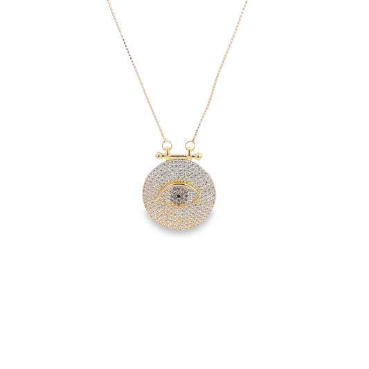 A delicate gold evil eye pendant necklace sparkles with pavé diamonds against a white background.