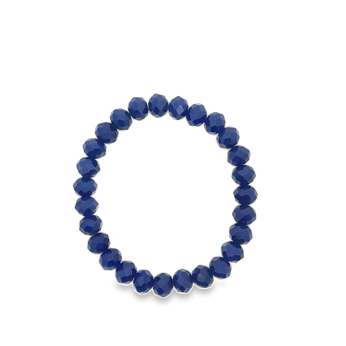 A stretch bracelet made of shiny, faceted royal blue crystal beads rests in a circle on a white background.