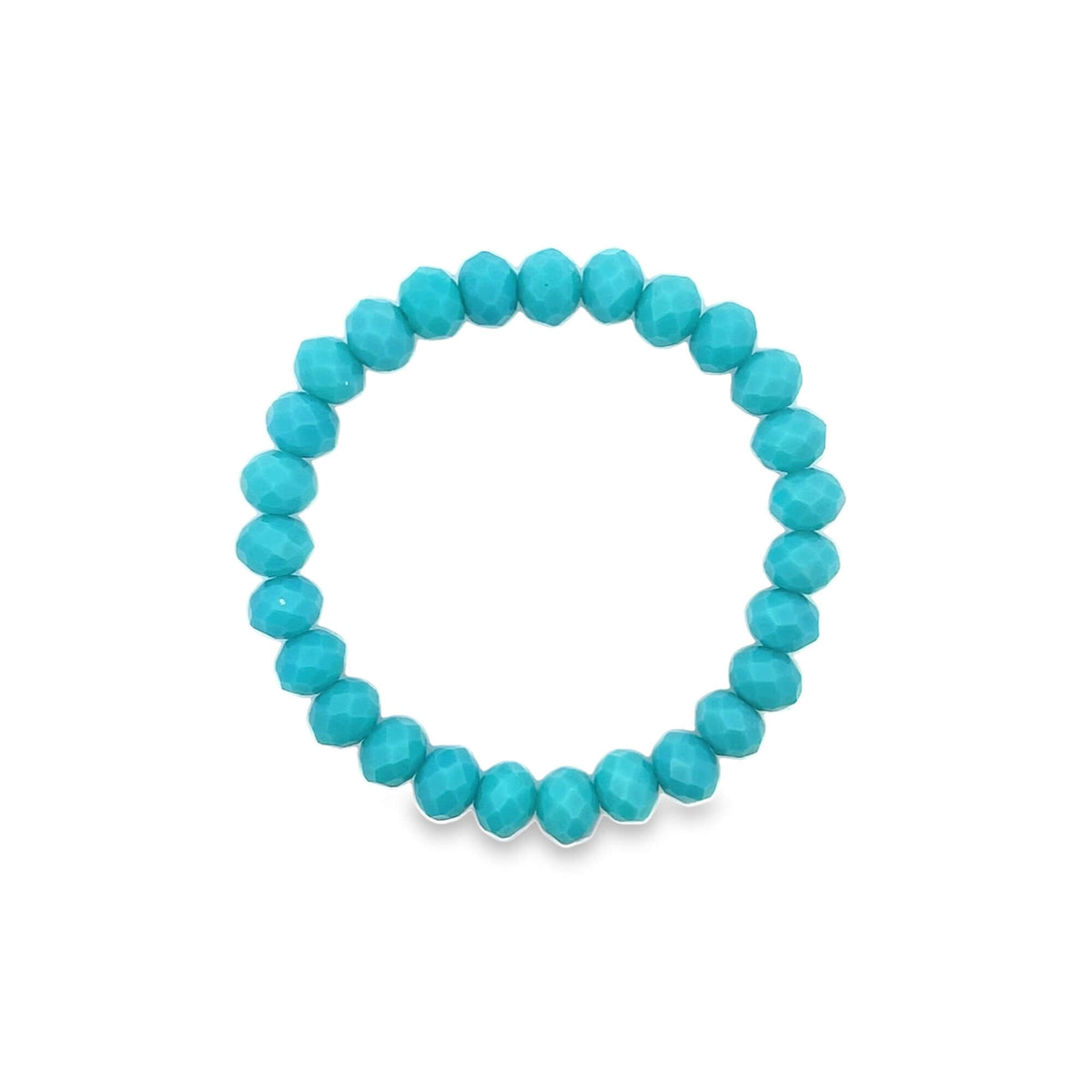 A turquoise beaded stretch bracelet rests against a plain white background.