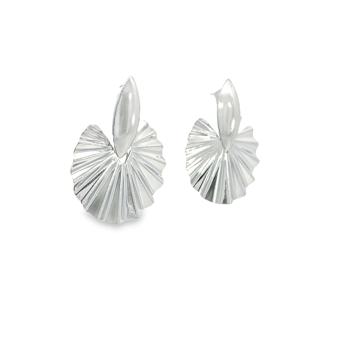 A pair of shiny silver statement earrings features a fluted, fan-shaped design suspended from smooth teardrop studs against a clean white background.