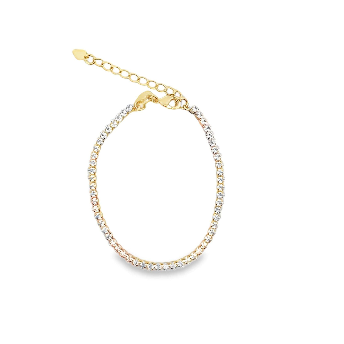 A delicate tri-color gold tennis bracelet sparkles with cubic zirconia stones against a clean white background.