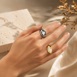 Elegant bee signet ring featuring a genuine Mother of Pearl inlay. Available in Gold Filled and Rhodium finishes with a timeless oval design perfect for everyday wear.