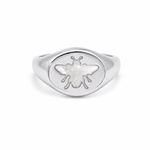 Elegant bee signet ring featuring a genuine Mother of Pearl inlay. Available in Gold Filled and Rhodium finishes with a timeless oval design perfect for everyday wear.