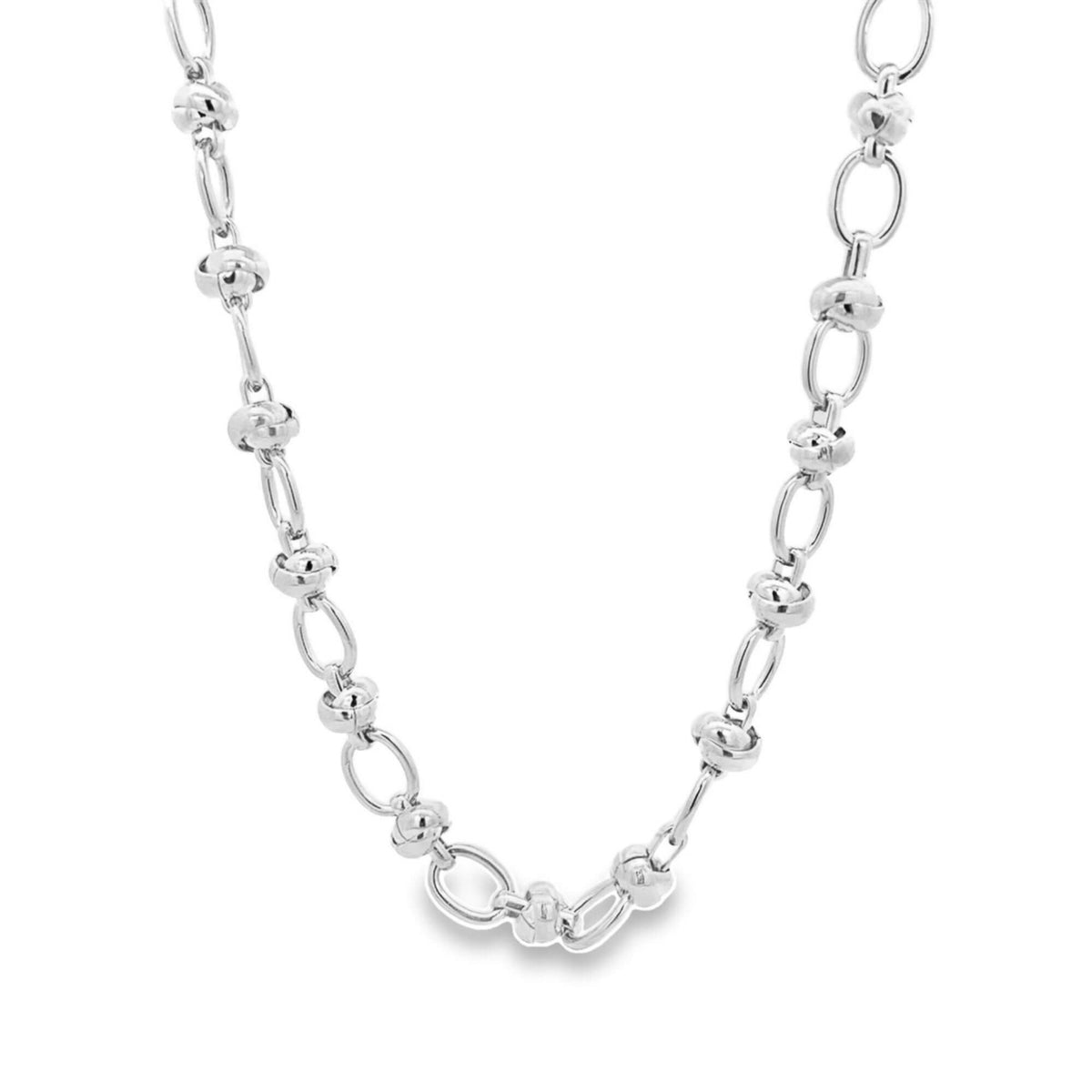 A polished silver chain necklace features alternating interconnected oval links and smooth ball accents against a white background.