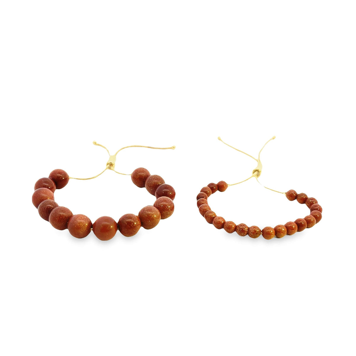 Two adjustable goldstone gemstone bead bracelets rest against a clean white background.