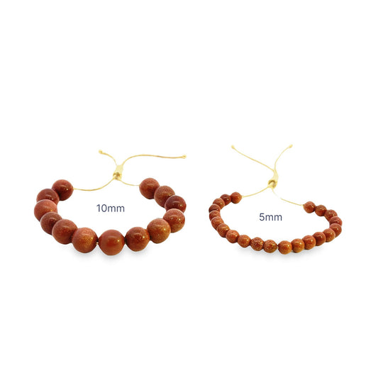 Two adjustable goldstone gemstone bead bracelets display a size comparison between 10mm and 5mm beads on a white background.