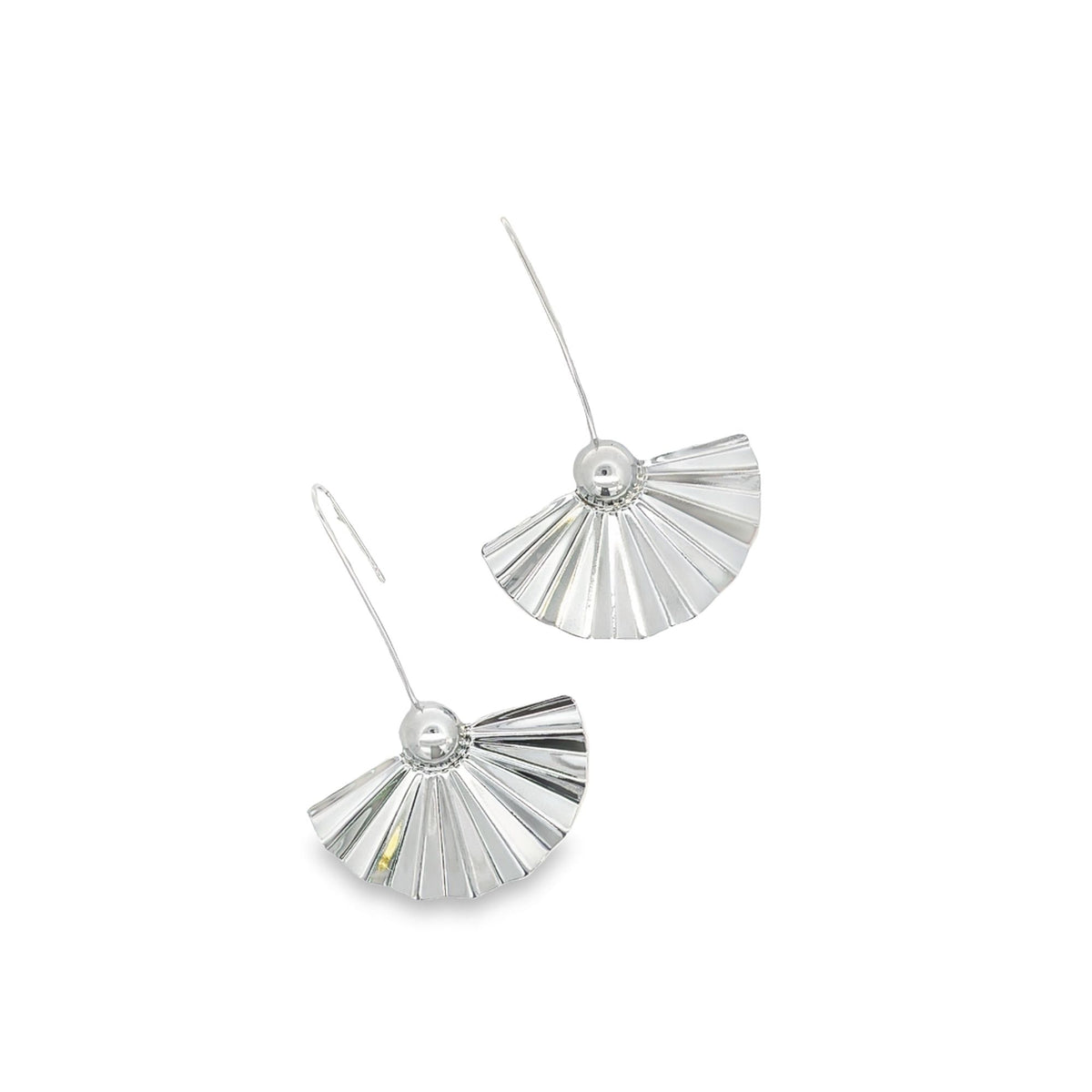 A pair of shiny silver fan-shaped drop earrings with curved wires rests against a white background.