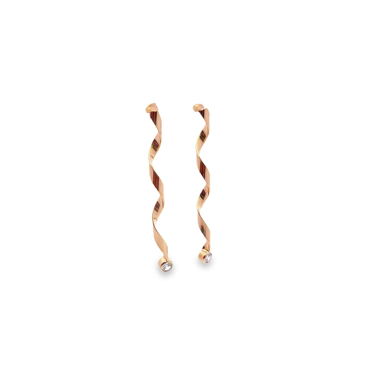 A pair of elegant spiral drop earrings crafted in rose gold features dangling wavy designs tipped with sparkling crystal stones.