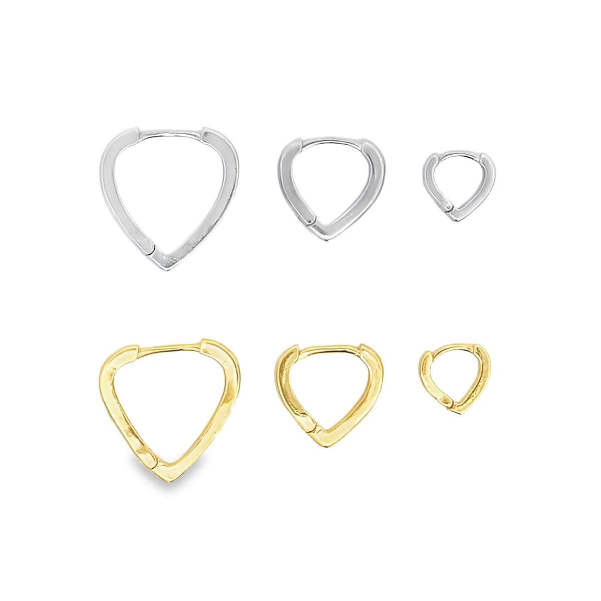 A collection of six heart-shaped huggie hoop earrings displays silver and gold finishes in three descending sizes against a white background.