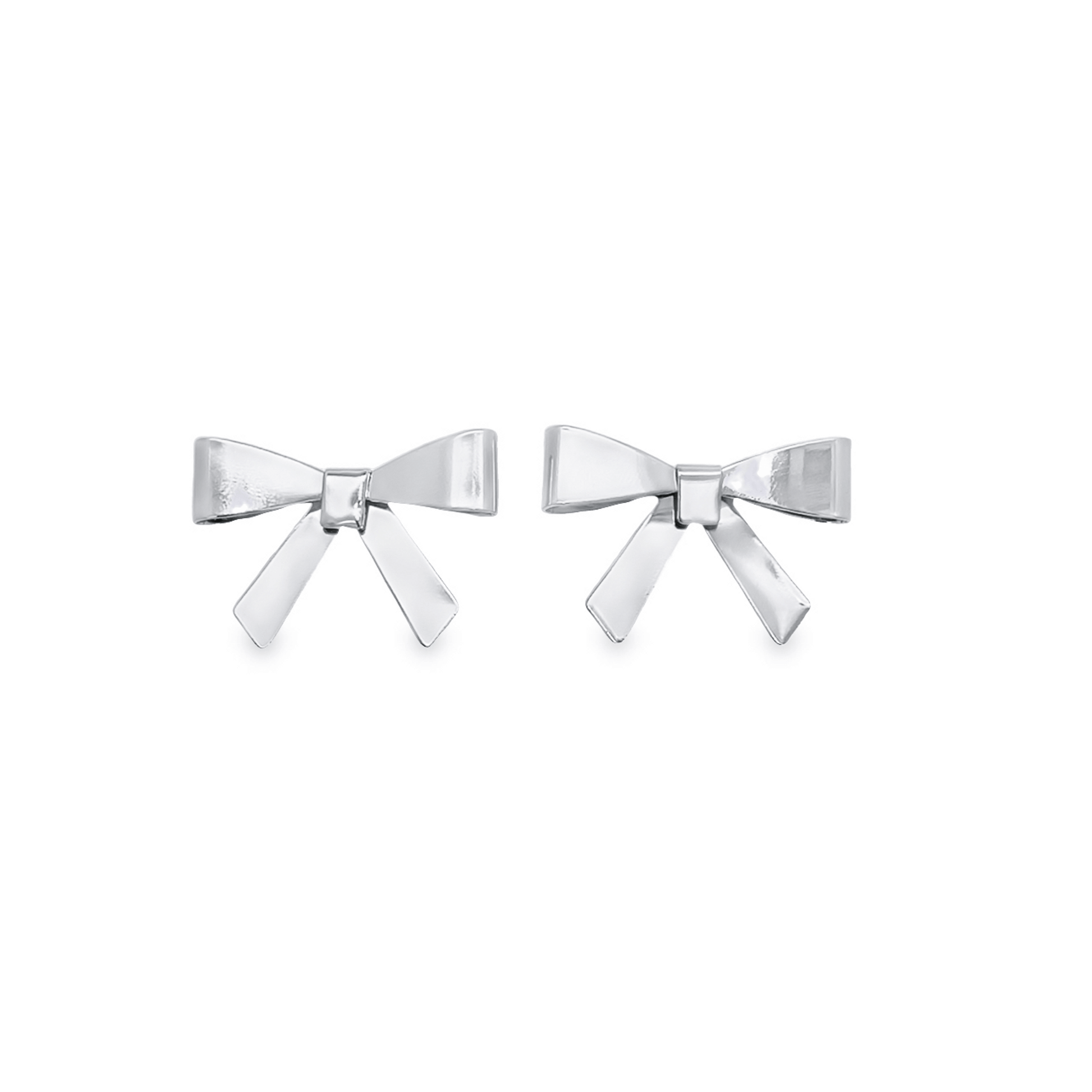 A pair of polished silver bow stud earrings resting against a clean white background.