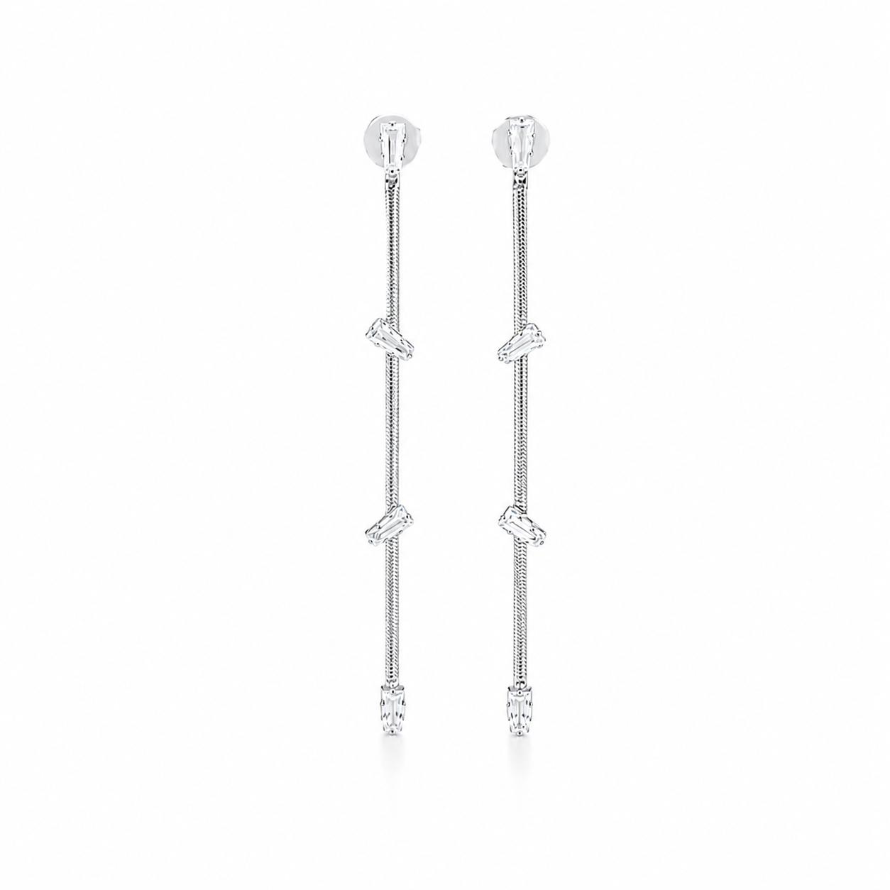 Modern drop earrings featuring a sleek herringbone chain accented with sparkling Cubic Zirconia. Available in Gold Filled and Rhodium finishes, offering a lightweight, elegant, and contemporary design.