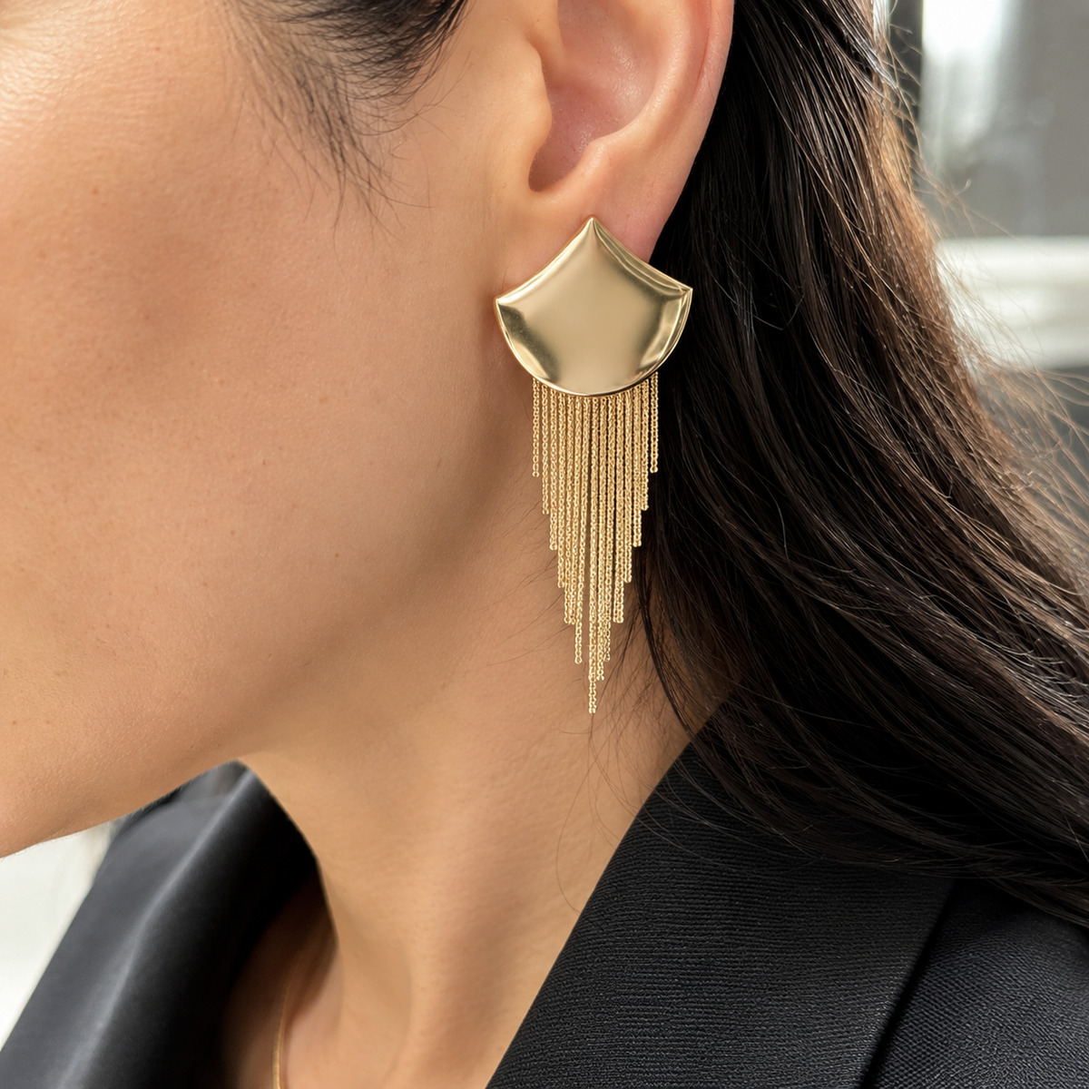 Elegant 18K gold filled fringe tassel earrings designed with cascading waterfall chains and a modern sculpted silhouette. Lightweight statement earrings perfect for weddings, parties, special occasions, and elevated everyday styling. Available in gold and silver finishes.