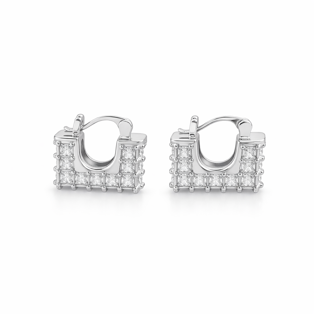 Modern square huggie hoop earrings with baguette-style CZ stones. Geometric U-shape design available in gold or silver. Perfect for stacking or everyday wear.