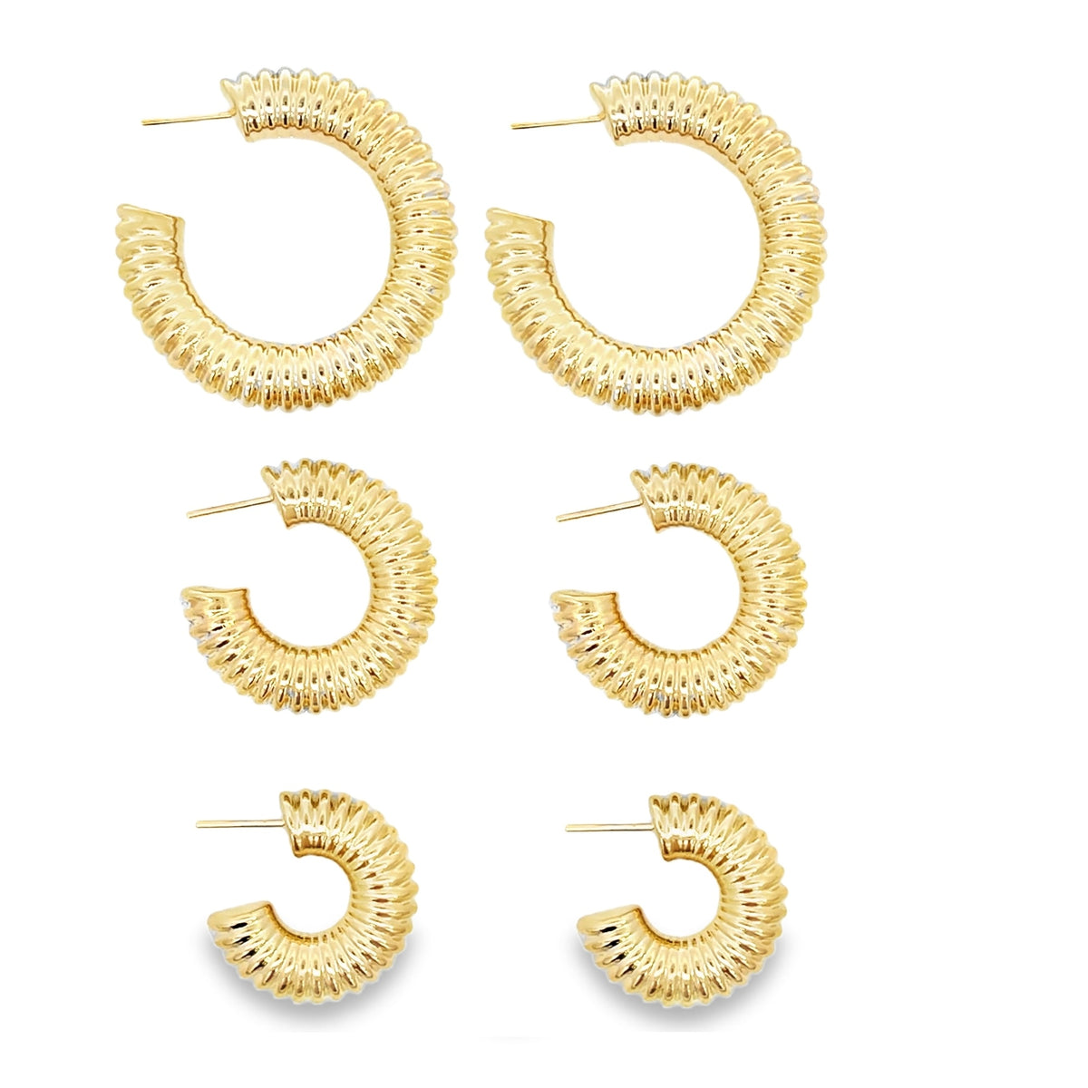 A set of three pairs of textured gold hoop earrings displays varying sizes arranged vertically on a white background.