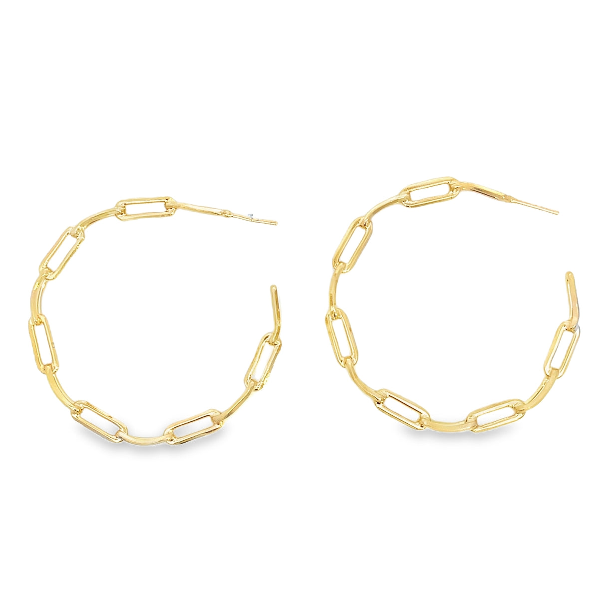 A pair of gold paperclip link hoop earrings are displayed against a clean white background.