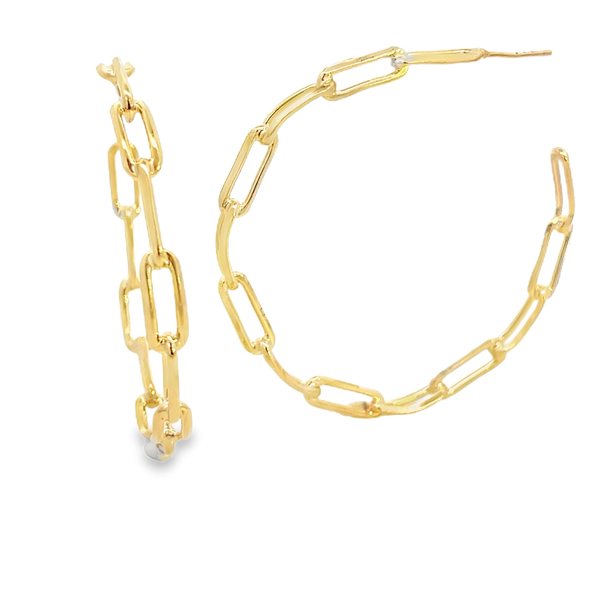 A pair of elegant gold paperclip chain hoop earrings gleams against a clean white background.