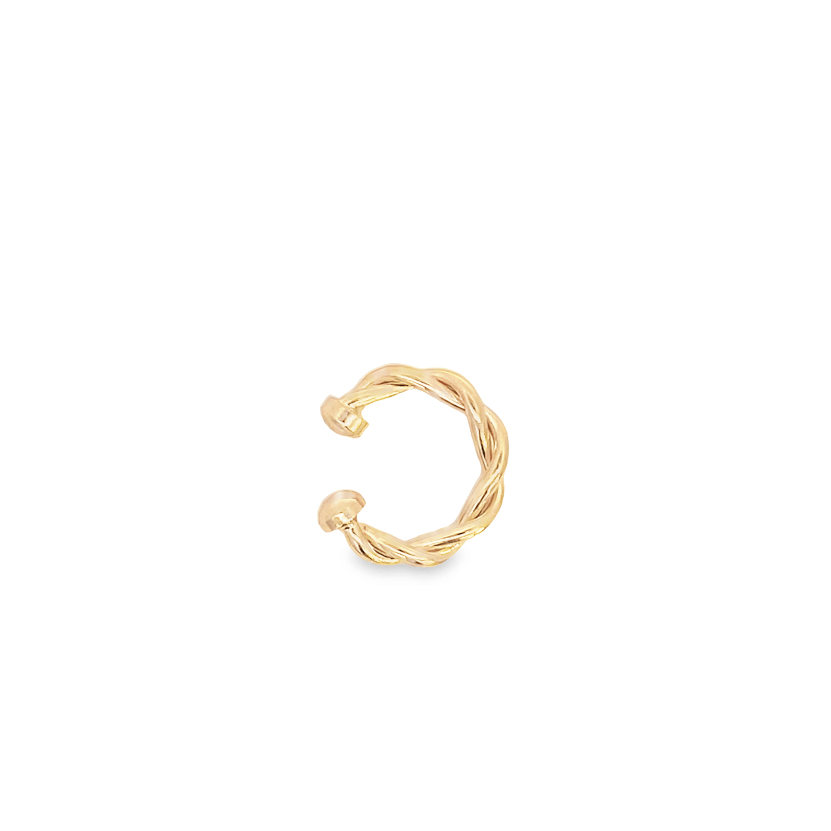 A polished gold ear cuff features a twisted rope design against a plain white background.