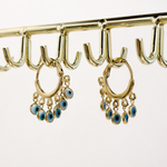 Stylish 18K gold filled evil eye charm earrings. Tarnish-resistant, lightweight and perfect for everyday wear with a meaningful touch.