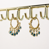Stylish 18K gold filled evil eye charm earrings. Tarnish-resistant, lightweight and perfect for everyday wear with a meaningful touch.