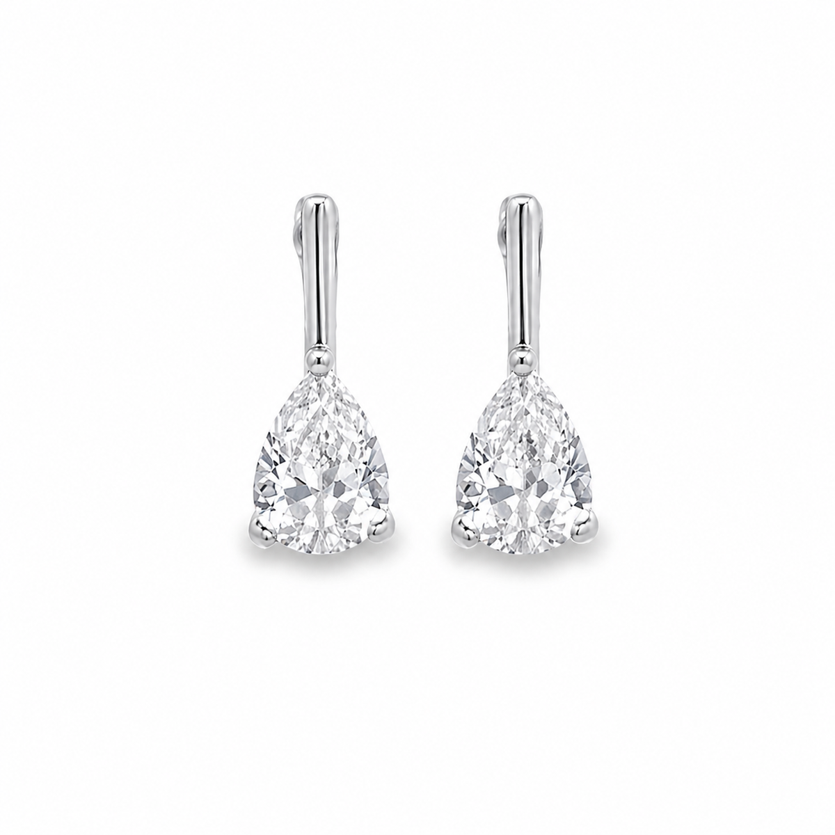 Elegant 18K gold filled pear drop earrings with a minimalist design.  lightweight and perfect for everyday wear or special occasions.
