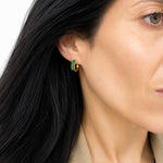 Elegant 18K Gold Filled huggie hoop earrings featuring baguette-cut cubic zirconia. Available in clear, emerald, turquoise, sapphire blue and fuchsia. Perfect for everyday wear.