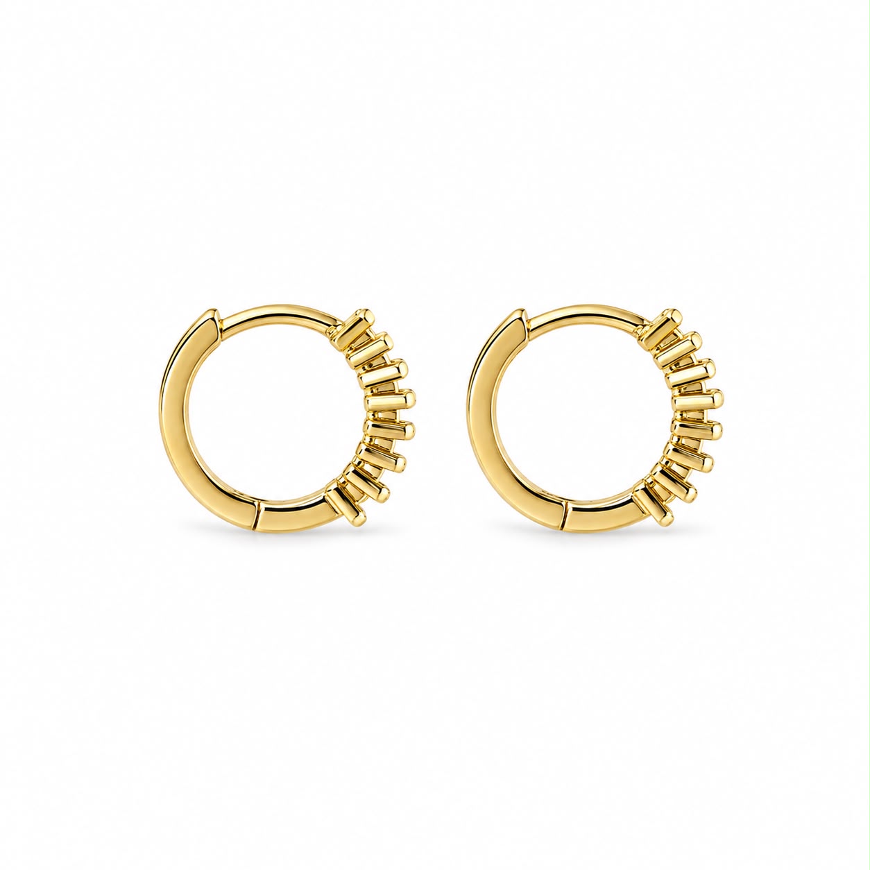Elegant 18K Gold Filled huggie hoop earrings featuring baguette-cut cubic zirconia. Available in clear, emerald, turquoise, sapphire blue and fuchsia. Perfect for everyday wear.