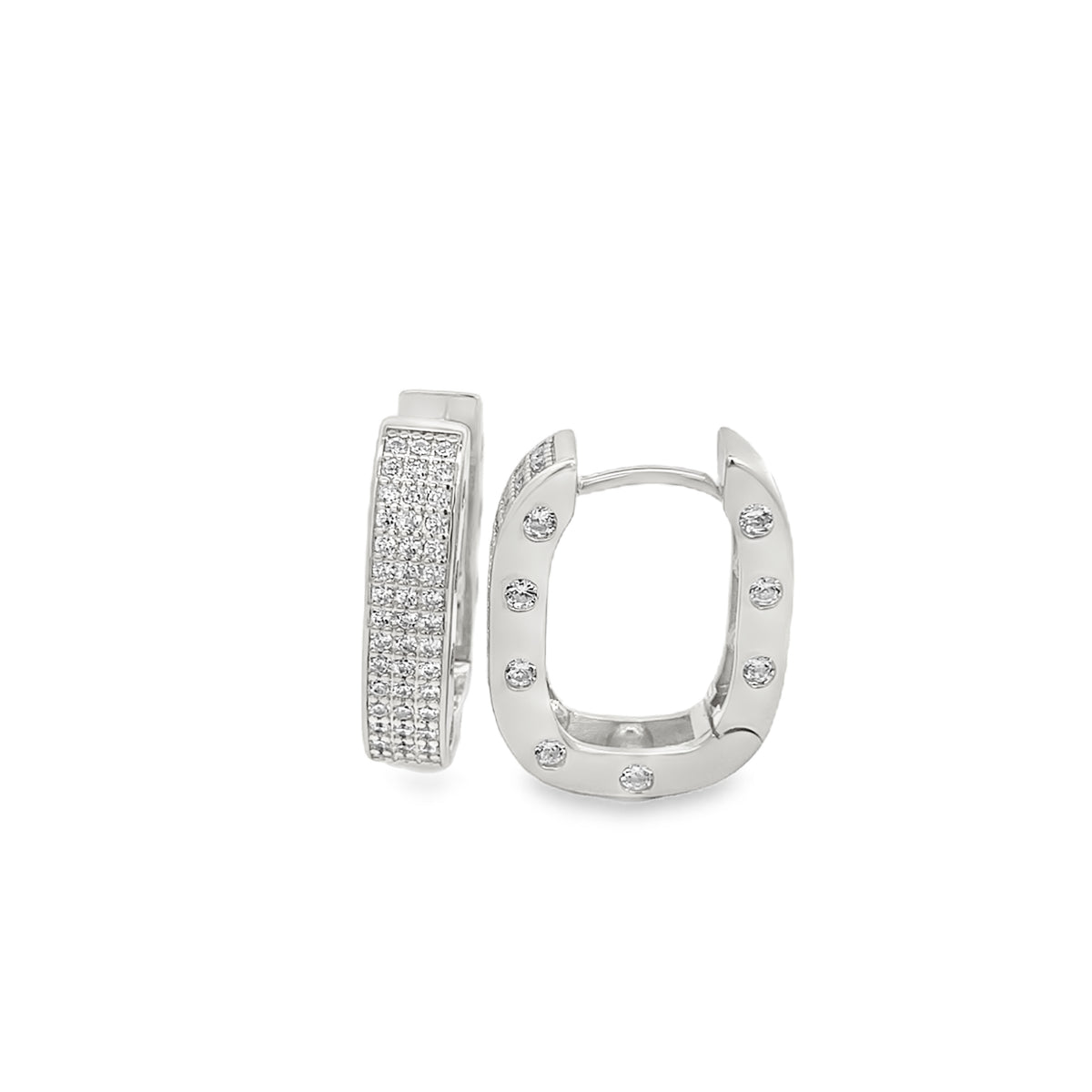 A pair of silver hoop earrings features pavé-set cubic zirconia stones on the front and individual inlaid crystals along the edges against a clean white background.
