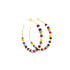 A pair of gold hoop earrings embellished with colorful multicolored seed beads sparkles against a clean white background.