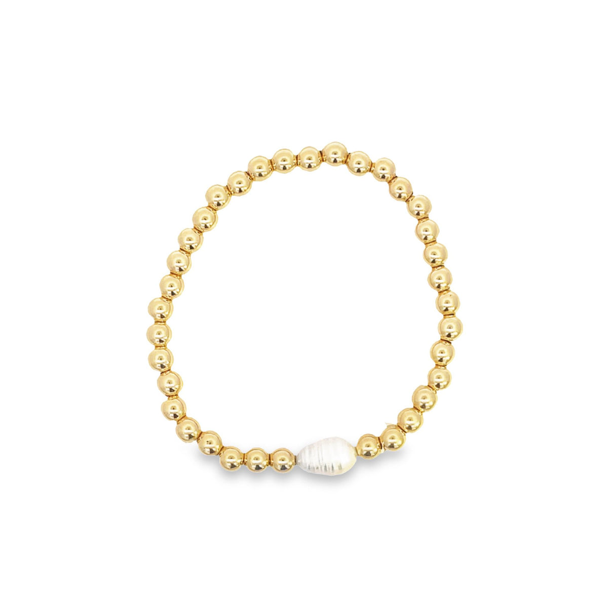 A gold beaded stretch bracelet features a single white freshwater pearl accent against a clean white background.