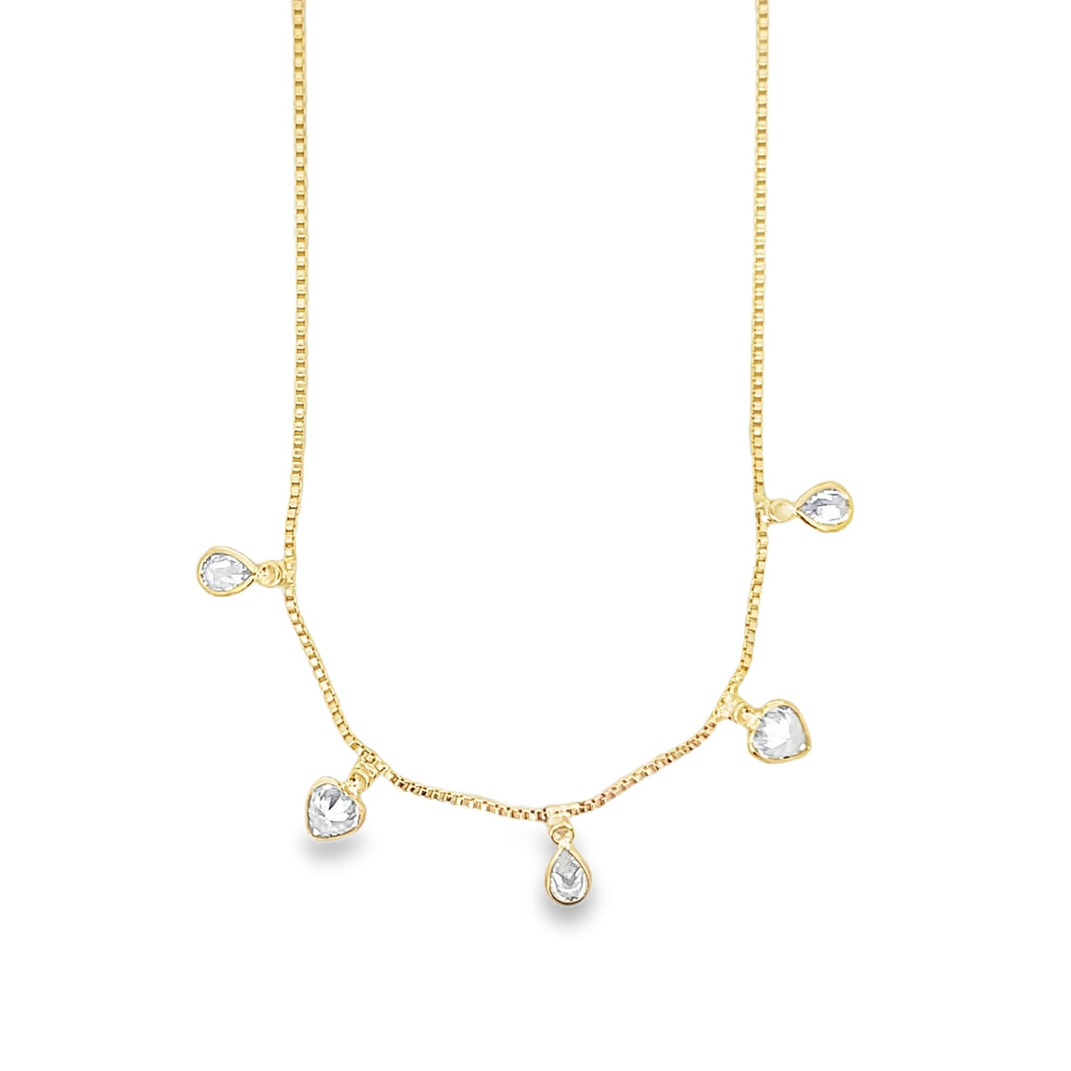 A delicate gold box chain necklace dangles charming crystal charms shaped like hearts and teardrops.