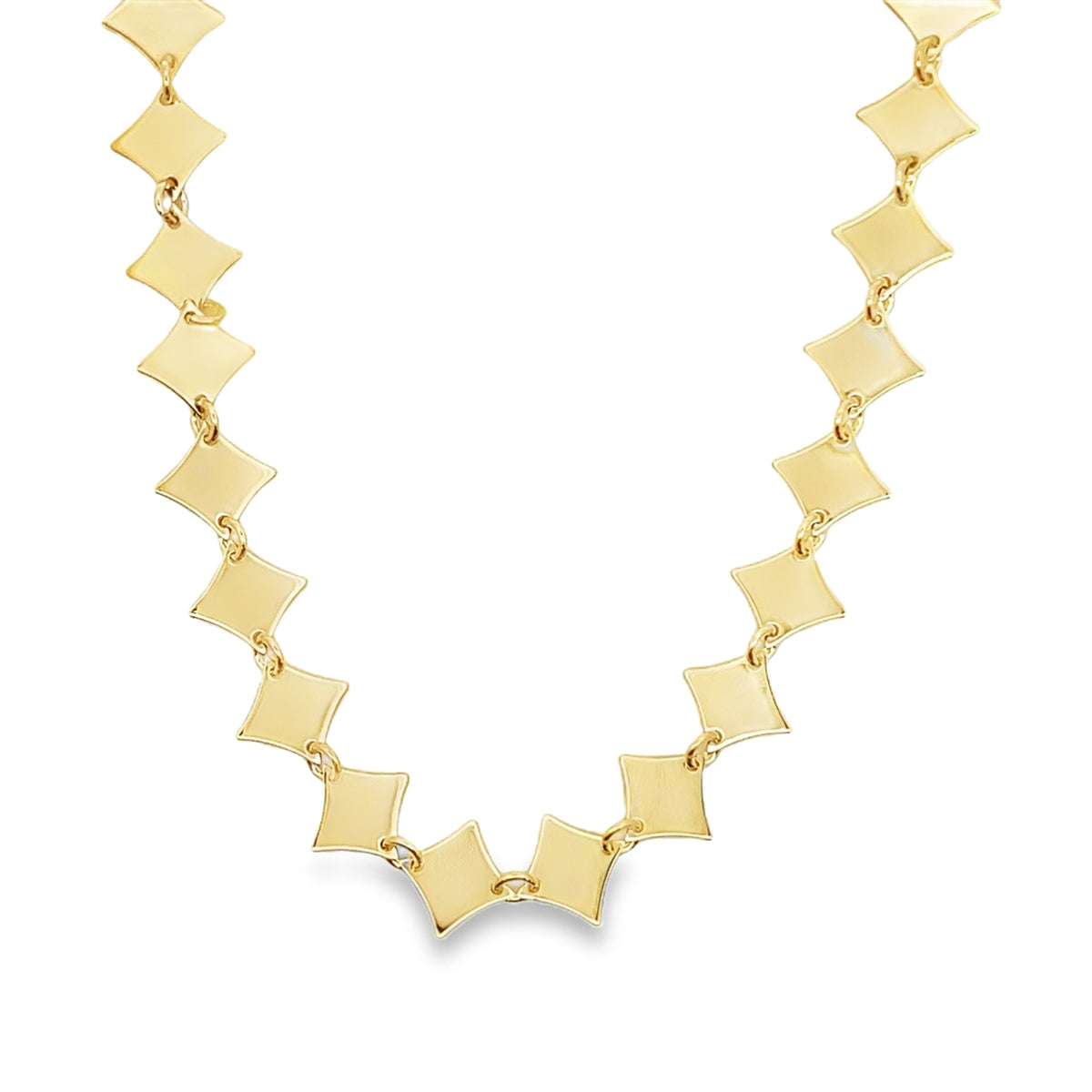 A gold diamond-shaped link necklace rests against a clean white background.